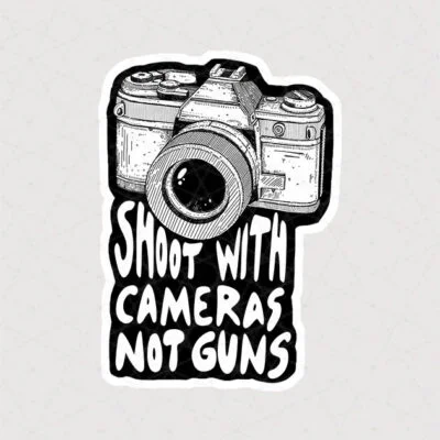 استیکر دوربین آنالوگ و قدیمی همراه با متن Shoot with cameras not guns