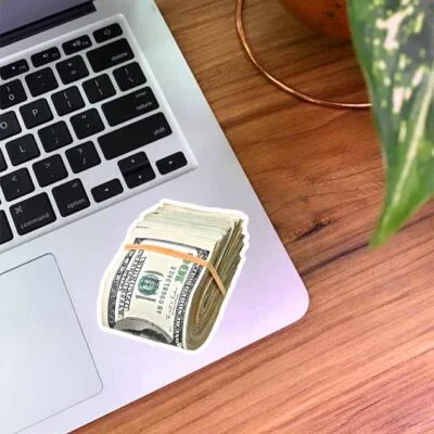 استیکر لپتاپ یه دسته اسکناس 100 دلاری آمریکا 
