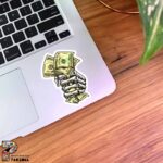 استیکر اسکناس در دست اسکلت