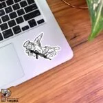 استیکر بچه فرشته در حال تیر اندازی با تفنگ