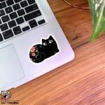استیکر گربه سیاه همراه با گل